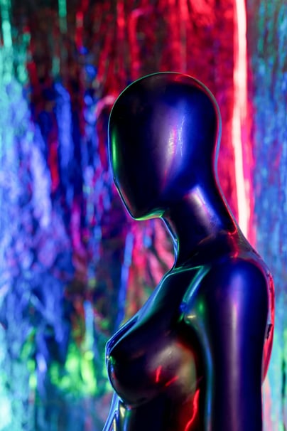 A figured that looks generated by a computer, a image portraying techno