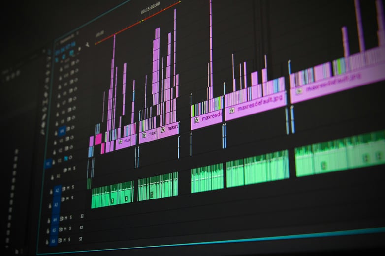 Image of the Logic Pro interface showing the timeline of a song with edits in the audio
